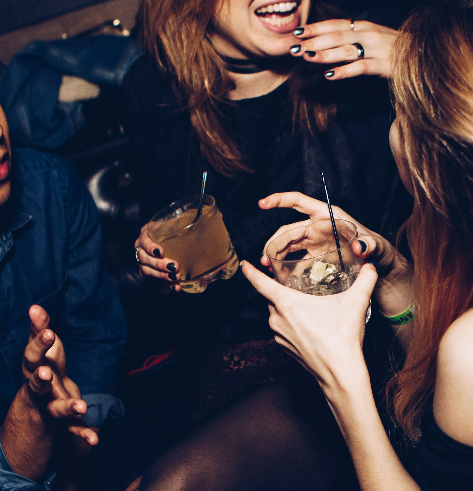 Friends laughing and celebrating together at a party
